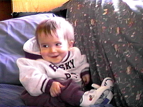 Devin trying to stand up to look out the window