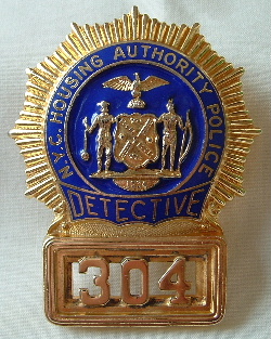 New York City Housing Authority Police Detective gold shield, made by and hallmarked "United Insignia"