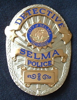 City of Selma Police Detective badge. Hallmarked V&V and dated 1990. Custom seal says indicates Selma is the "World Raisin Capital"