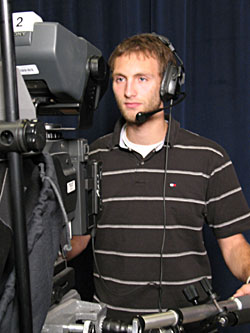 David Byers operating a video camera at The Howard County Government TV office