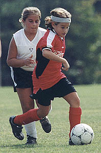 Cari moves the ball downfield