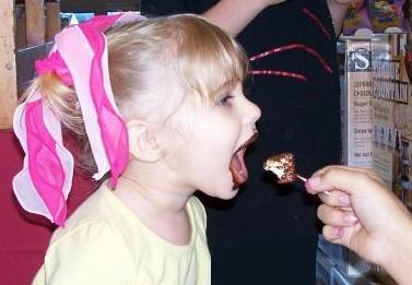 girl eating chocolate