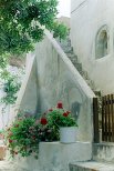 The church yard where I found red flowers against white backdrop