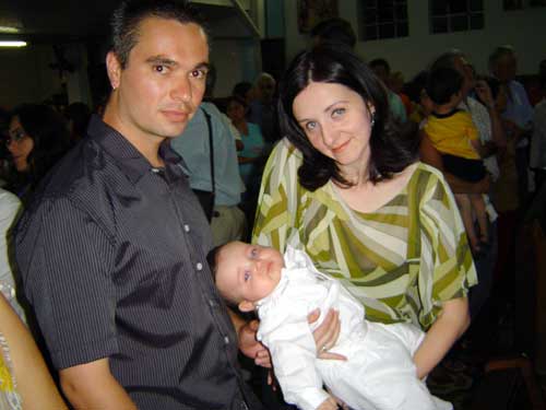 Com papai e mam&atilde;e no batizado!