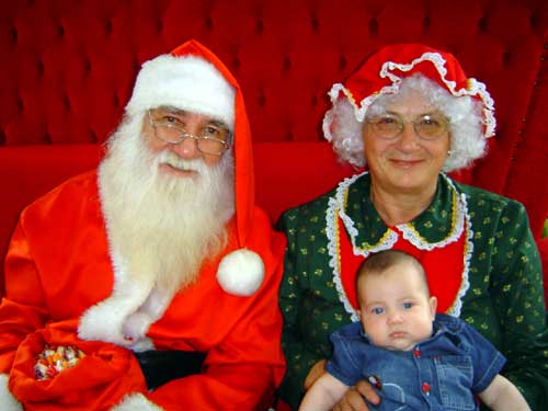 Com Papai e Mam&atilde;e Noel