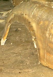 Rear left guard, note screws where arch mount is.
