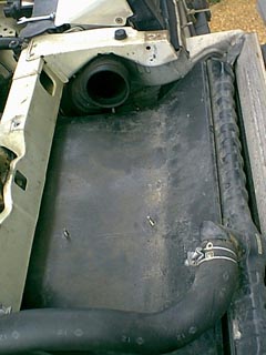Close-up of the intake, notice bolts where the air filter is to be located.