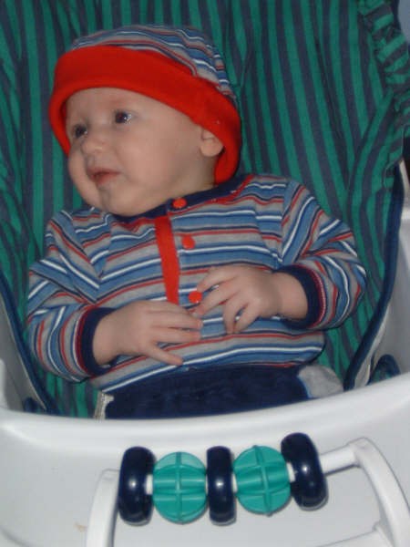 Mom makes me wear these dumb hats!!
