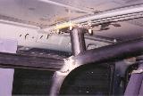 Driver's side sandwich plate on rear, internal hoop.