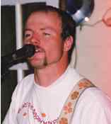 Derek singing backup