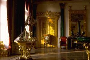 Plush tapestries and priceless antiques add warmth to each room.