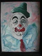 As a rule, Clowns are always frightening, of course. But this one, with its craggy facial featires peeking from under the greasepaint and its red pulpy-looking mouth, takes the proverbial cake. Notice the David Bowie eyes. Also notice the little dark maroon stains that look like blood. Let's not think about it.