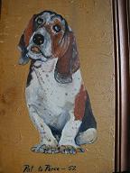 In 1952, Pat presented this to Perce. We know not what Perce's feelings were about the gift, but we do know it ended up in a yard sale. Pat would surely be proud to know that it hangs in a gallery today, even one as disreputable as this. The painting is really actually very good, and I especially appreciate the economy of using the actual color of this peculiar wood scrap for much of the dog's face and his open mouth.