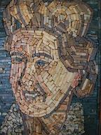 This is an extremely heavy mosaic, done in such a haphazard style that almost suggests the goal was to see how fast it could be completed. It was found left behind in a house by the next people to move in. The identity of the person depicted may forever remain a mystery. For awhile I thought it was Liberace, then I thought it was Beethoven. Or Henry Hotchkiss.  My current theory is that it's Rose Marie.
