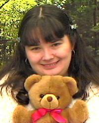 Debbie with a Teddy Bear, taken February 18, 1999.