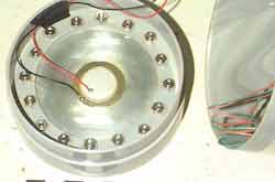 The piezo crystal bonded to its acoustic plate