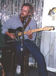 Ed playing guitar