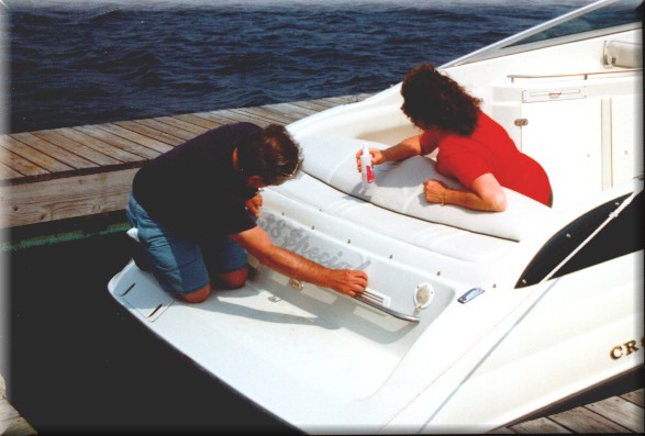 A photo of Denny lining up lettering sheet