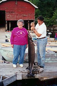 64" 85 pound&nbsp; Sturgeon caught by Mary Braun with a 6' medium light St. Croix rod on 6# test line. This fish is almost as long as Mary is tall!