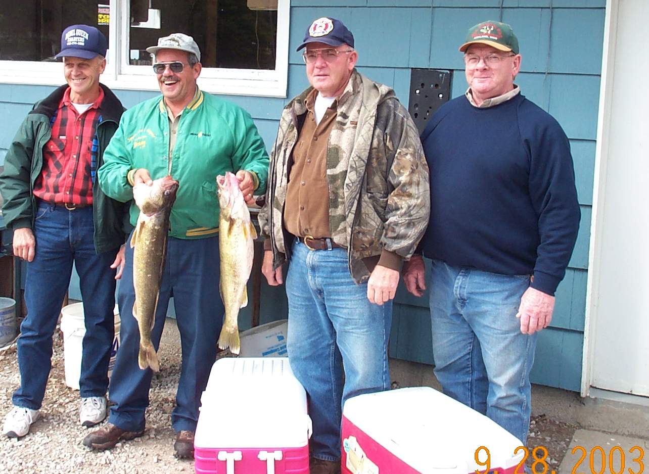 Bob, Den, Fred and Red after winning the cranberry Creek appreciation day tourney with a big fish of almost 30".