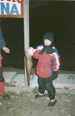 Joey Rini being proud of his first tournament fish