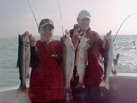 Kelly ~ a photo of my kids yesterday with their limit of Steelhead