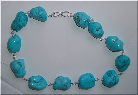blue turquoise nugget and silver necklace.