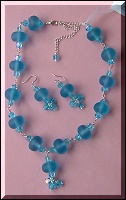 blue resin and crystal necklace and earrings