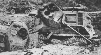 These T-34/85s were destroyed by air attack and later bulldozed off the road.