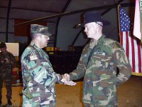 CSM Villasenor shakes SFC Clark's Hand