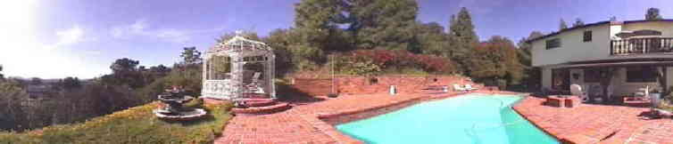 This is a a summer-time panorama from our backyard