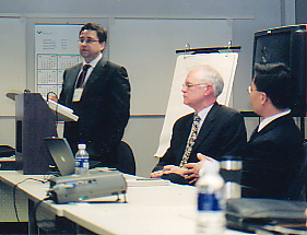 Moderator and two speakers