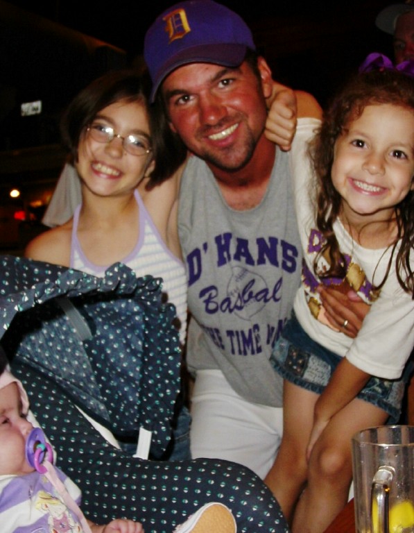 Coach Craft with his girls after the win in Marble Falls,TX