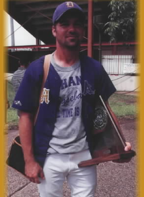 Coach Craft holding the trophy.TAKEN BY STACY
