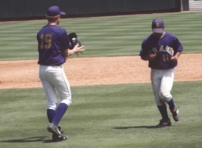 James throws his helmet to Justin Martin who's coming in to run for him.