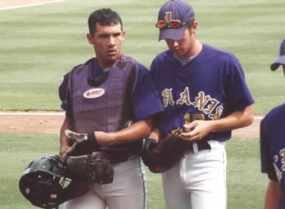 Marcus and Noah walking back into the dugout. 