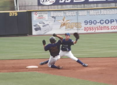 Meliton sliding into 2nd base