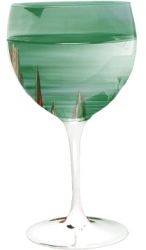 wineglass used as a mask over green castle tops graphic.