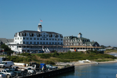 View of New Shoreham Harbor the large white hotels along the main road, Water Street