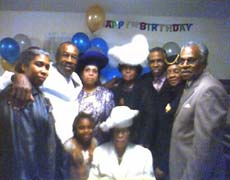 Part of the 1st family at Bishop's birthday celebration. From left to right, Claudette Cooke, Elder Wiley Cooke, Evangelist Parmelia Cooke, 1st Lady Mary Bernice Cooke, Pastor & Founder, Bishop Cooke, Vivian & Clarence Mitchell, Great-Grand-daughter, Syhonna Cooke, Missionary Pauline Jeffereys, Bishop's Mother.