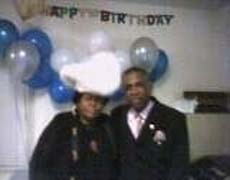 1st Lady Missionary Mary Bernice Cooke and husband Bishop C. E. Cooke celebrating his birthday November 2004.