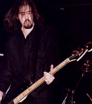 Krist playing guitar