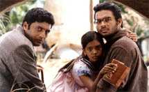 Prakash Raj, R Madhavan and P S Keerthana in Kannathil 

Muthamittal