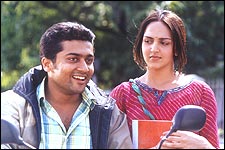 Surya and Esha Deol in AAYITHA EZHUTHU.