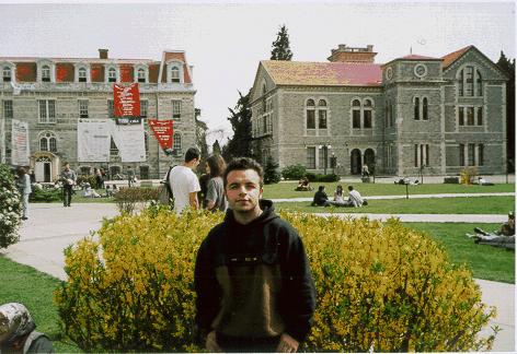 DJ KARACA at Bogazici University standing on the grass...