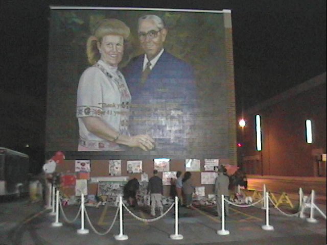 Members pay tribute to Brother Hyles at the east wall of the Walker Building, where his portrait was painted.