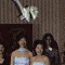 Bouquet toss, look at who is all in a hurry to get it