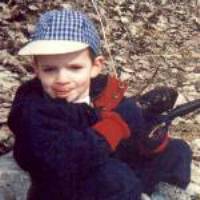 Michael fishing on April, 2 2001 about to catch his first ever fish!