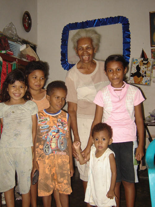 Ester Kereway and her grandchildren. This photo was shot by T.R. Dewi on May 31, 2006