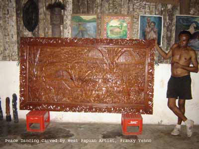 Peace Dancing carved by West Papuan artist Franky Yenno. Photo shot by Charles Roring